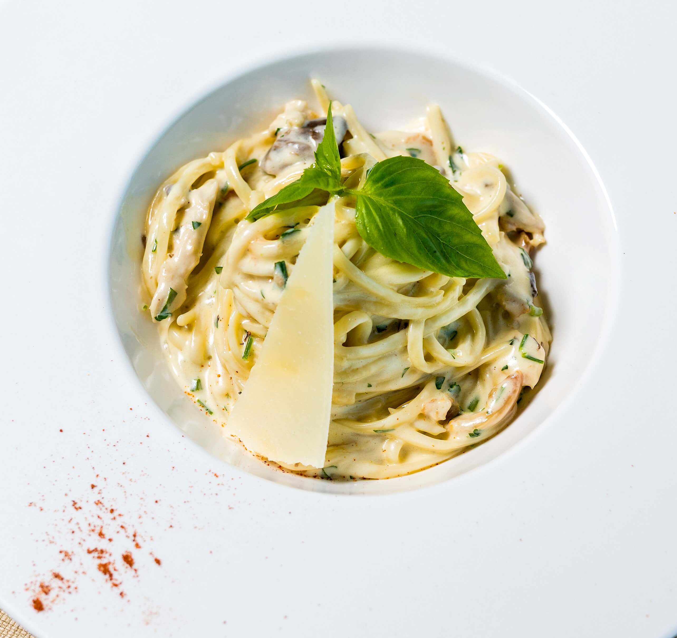 An image of cheese and herb pasta to represent herbs for cheese.