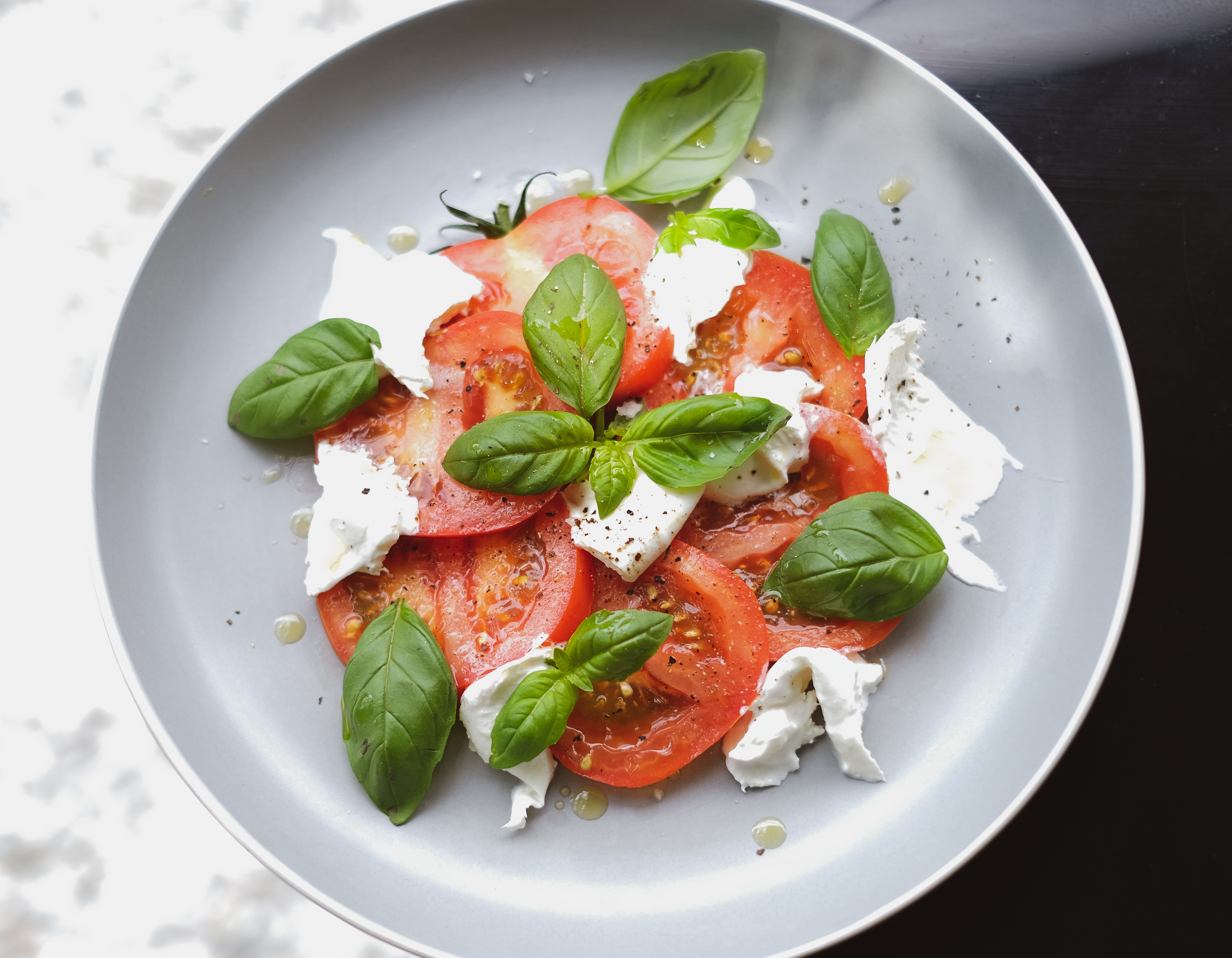 Caprese salad to show summer herbs and spices you should be cooking with