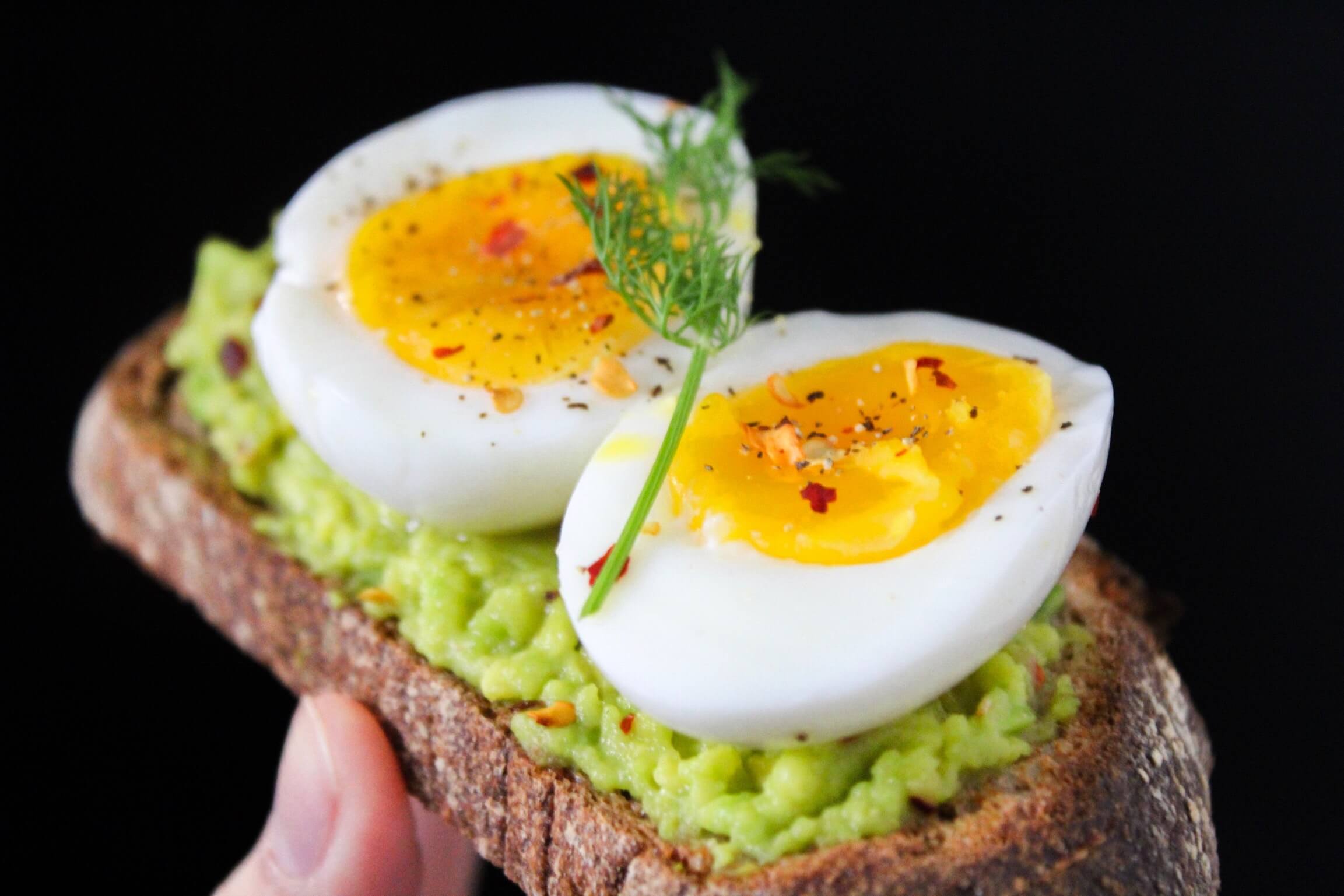 An image of seasoned boiled eggs to with produce from our spice wholesalers.